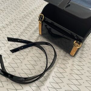 Elegant Black and Gold Women's Handbag